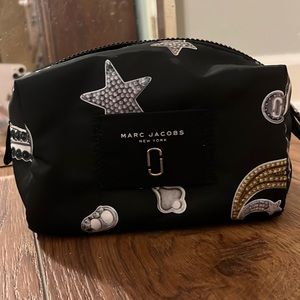 This is a 100% authentic Marc Jacobs make up case. It’s in perfect condition.